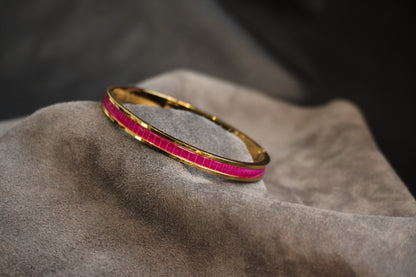Bracelet en acier inoxydable plaqué or 24 carats et cuir éxotique (alligator, lézard, serpent)