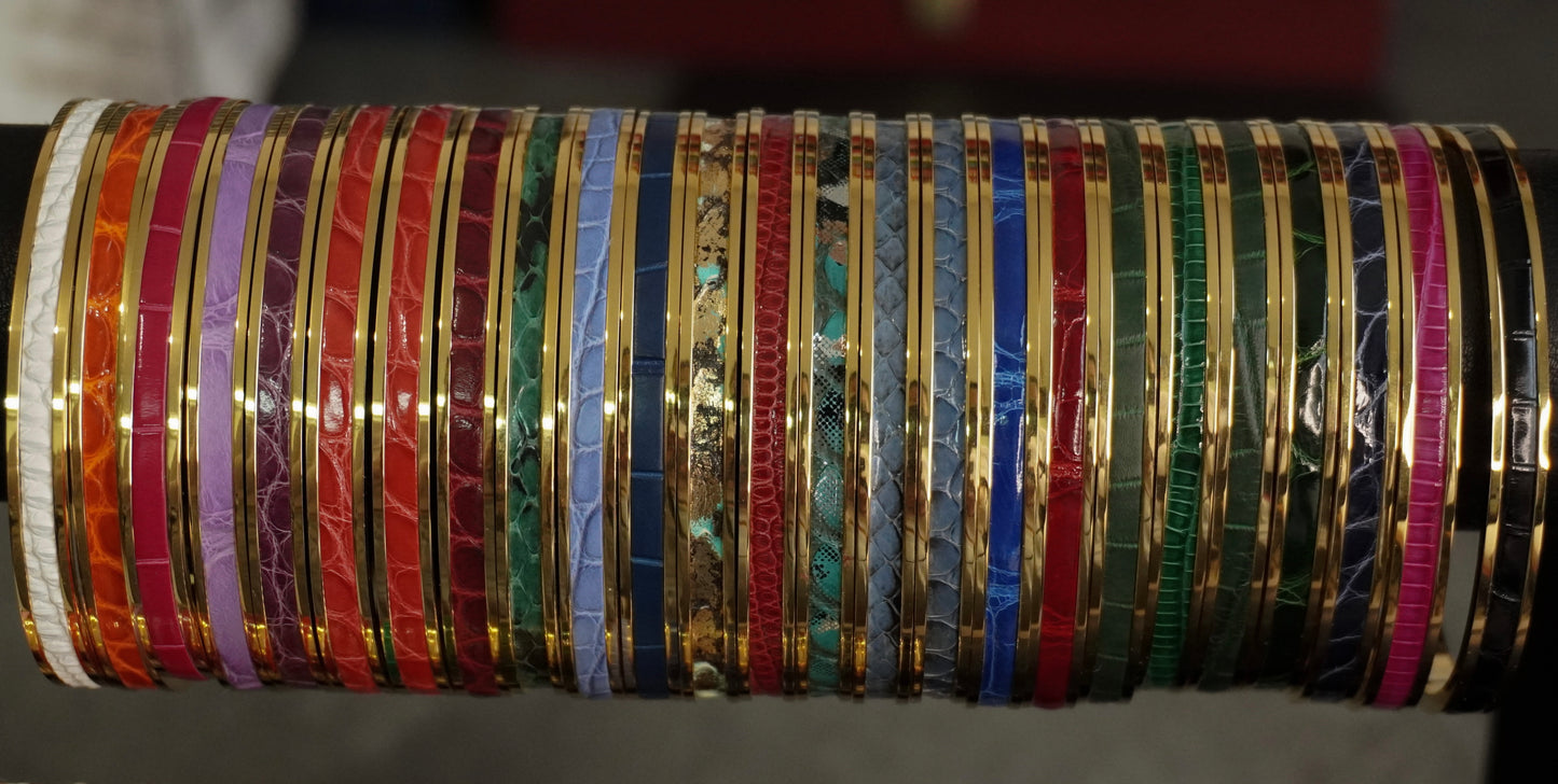 Bracelet en acier inoxydable plaqué or 24 carats et cuir éxotique (alligator, lézard, serpent)