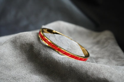 Bracelet en acier inoxydable plaqué or 24 carats et cuir éxotique (alligator, lézard, serpent)