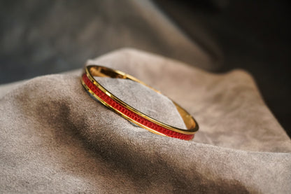Bracelet en acier inoxydable plaqué or 24 carats et cuir éxotique (alligator, lézard, serpent)