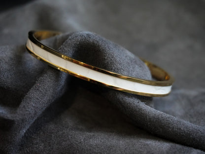 Bracelet en acier inoxydable plaqué or 24 carats et cuir éxotique (alligator, lézard, serpent)