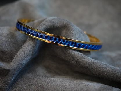 Bracelet en acier inoxydable plaqué or 24 carats et cuir éxotique (alligator, lézard, serpent)