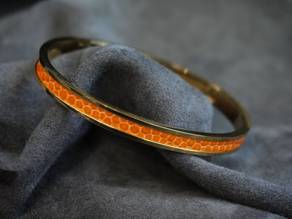 Bracelet en acier inoxydable plaqué or 24 carats et cuir éxotique (alligator, lézard, serpent)