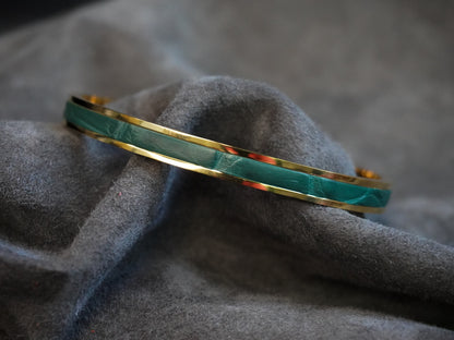 Bracelet en acier inoxydable plaqué or 24 carats et cuir éxotique (alligator, lézard, serpent)